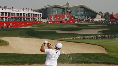 Leader Andy Sullivan is grouped with Bryson Dechambeau (Am) and Rory Mcilroy. Paul Childs / Reuters