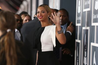 Beyonce attends the Grammy Awards in 2013 wearing Osman. Getty Images