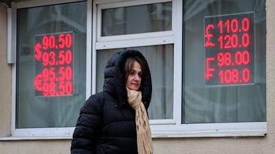 A currency exchange in Moscow. The rouble has strengthened against the dollar amid expectations of warmer ties between Russia and the US. EPA