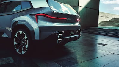 The 23-inch alloys with spinning centre caps keep the BMW logo (scripted in chrome letters) upright.