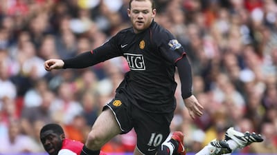 Wayne Rooney of Manchester United evades Kolo Toure of Arsenal in 2007. Getty