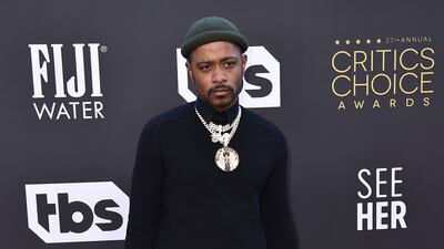 LaKeith Stanfield keeps things casual with a beanie hat and silver jewellery. AFP