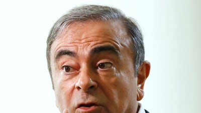 Former Nissan Chairman Carlos Ghosn speaks to Japanese media during an interview in Beirut. AP