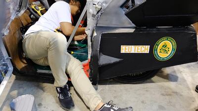 Teams work in the paddock. Mindy Tan for Shell