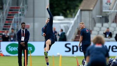 Craig Overton bowls during a nets session. PA