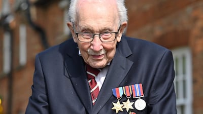 Second World War veteran Captain Tom Moore, from Britain, pictured during his fundraising challenge for healthcare staff, which raised £39 million. AFP