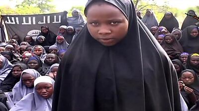 A screengrab taken on May 12 from a video of Nigerian Islamist extremist group Boko Haram shows a girl wearing the full-length hijab talking to the camera at an undisclosed rural location. Boko Haram released a new video claiming to show the missing Nigerian schoolgirls, alleging they had converted to Islam and would not be released until all militant prisoners were freed. AFP PHOTO