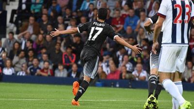 Chelsea's Pedro celebrates after scoring the opener in his team's 3-2 win over West Brom in the Premier League on Sunday. Will Oliver / EPA / August 23, 2015