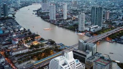 The Chao Praya runs through the Thai capital and is an important mode of transport, supporting a vast network of barges and ferries. Bloomberg News