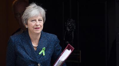 British Prime Minister Theresa May says there should be a 'true parity' between mental and physical health. EPA
