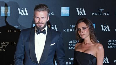 David, in a silk-trimmed tux, and Victoria Beckham attend the Alexander McQueen: Savage Beauty gala at the V&A in London, England, on March 12, 2015. EPA