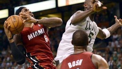 LeBron James, left, was not going to let Kevin Garnett or any of the other Celtics to stop him from delivering a Game 6 win to the Heat and force the series back to Miami for Game 7.