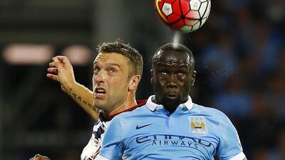 Manchester City’s Bacary Sagna in action with West Brom’s Rickie Lambert. Darren Staples / Reuters / August 11, 2015