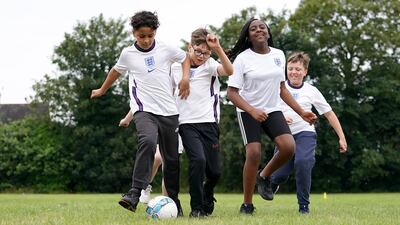 Pupils of Button Lane Primary School in Wythenshawe, Greater Manchester. PA Wires