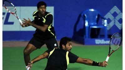 Rohan Bopanna, left, and Asiam-ul-Haq Qureshi have become a formidable doubles team. Dibyangshu Sarkar / AFP