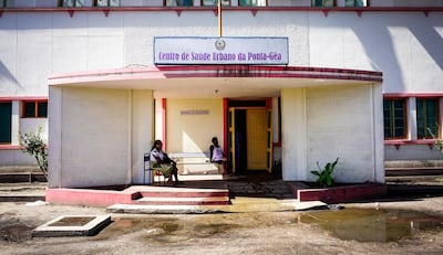 Women sit outside the Centro de Saude Urbano da Ponta-Gea, the second-biggest hospital in Beira, Mozambique. March 22, 2019. Jack Moore/The National