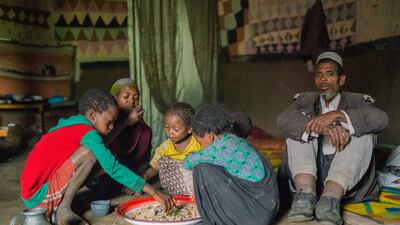 Mr Mukhtar with some of his 10 children. Photo: End Fund