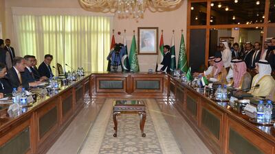 The UAE and Saudi delegations with Shah Qureshi. AFP