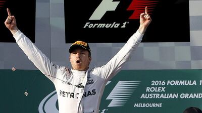 Mercedes F1 driver Nico Rosberg (L) celebrates after winning the Australian Grand Prix in Melbourne. REUTERS/Brandon Malone