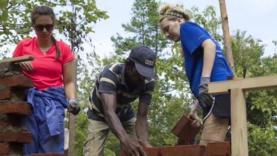 A group of pupils from the UAE’s American Community Schools are spending their school break with the charity Habitat for Humanity learning new skills and building homes for needy families in Jordan and Sri Lanka. Courtesy American Community School