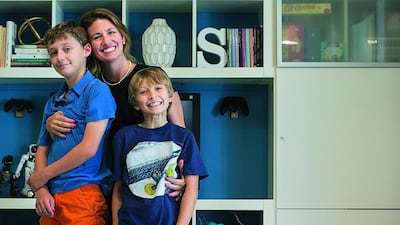 Celest Sanderson with her sons Liam, left, who suffers from severe asthma, and Corey. Mona Al Marzooqi / The National