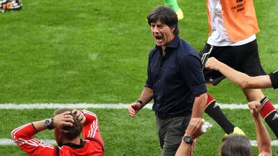 Germany coach Joachim Loew celebrates one of his team's goals on Tuesday in their 7-1 win over Brazil at the 2014 World Cup semi-finals in Belo Horizonte, Brazil. Andreas Gebert / EPA / July 8, 2014