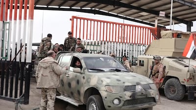 Syrian government forces cross the border into Iraq at Al Qaim. Reuters