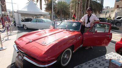 Haseb Zada from Afghanistan with his classic car a 1966 Chevrolet Corvette Stingray, at the 5th Emirates Classic Car Festival. Jeffrey E Biteng / The National