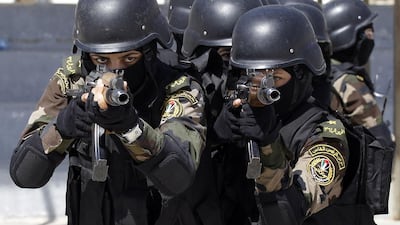 The women performed their drills at the walled Presidential Guards training complex in Jericho. Ammar Awad / Reuters