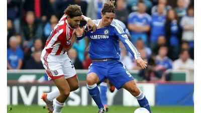 Jonathan Woodgate was stellar in the defence to block the efforts of Fernando Torres and Chelsea. Clive Brunskill / Getty Images
