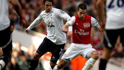 Robin van Persie, right, in action scored for Arsenal on Sunday.