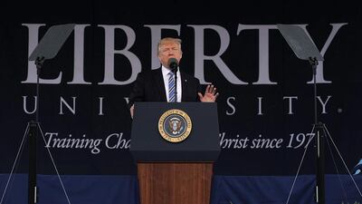 The US president Donald Trump delivers the commencement address at Liberty University in Lynchburg, Virginia, on May 13, 2017. Alex Wong / Getty Images / AFP