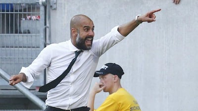 Bayern Munich manager Pep Guardiola directs his side during their Bundesliga victory over Hoffenheim on Saturday. Ralph Orlowski / Reuters / August 22, 2015