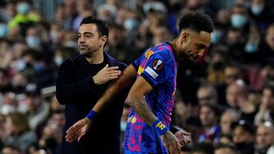 Barcelona manager Xavi Hernandez with Pierre-Emerick Aubameyang. EPA