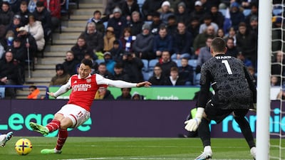 Arsenal's Gabriel Martinelli scores his team's first goal against Leicester City at the King Power Stadium on Saturday, February 25, 2023. AFP