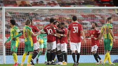 Manchester United celebrate taking the lead. EPA