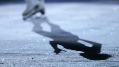 Carolina Kostner of Italy casts a shadow as she begins her routine in the figure skating exhibition gala at the Iceberg Skating Palace during the 2014 Winter Olympics on Saturday, February 22, 2014, in Sochi, Russia. Ivan Sekretarev / AP Photo