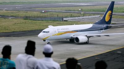 Jet Airways, part-owned by Etihad Airways, declared a net profit of 12.1 billion rupees in the year to the end of March, compared to a loss of almost 21bn rupees in the same period a year earlier. Punit Paranjpe / Reuters