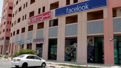 The owner of Facelook, a hairdressing salon at Discovery Gardens, insists that any similarity between the name and logo of his business and a well-known social media giant is entirely coincidental. Jeffrey E Biteng / The National