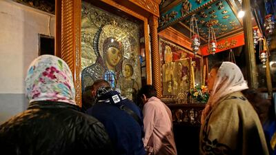 Christian pilgrims visit the Church of the Nativity in Bethlehem on Christmas Eve. The city also hosted the Abrahamic Reunion as Muslims, Christians, Jews and Druze met to celebrate Christmas together. AFP