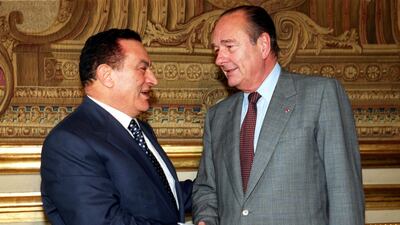 French President Jacques Chirac (R) shakes hands with his Egyptian counterpart Hosni Mubarak at the Elysee Palace in Paris 03 July 1999. AFP