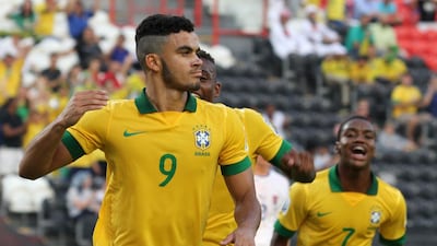Brazil's Mosquito celebrates after scoring one of his three goals during their Fifa Under 17 World Cup match against Slovakia at Mohammed bin Zayed stadium in Abu Dhabi on Thursday. AFP Photo