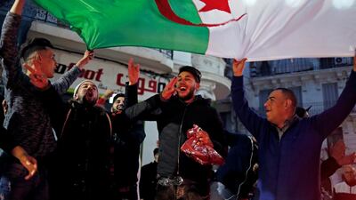 People celebrate on the streets after President Abdelaziz Bouteflika announced he will not run for a fifth term, in Algiers, Algeria March 11, 2019. REUTERS/Zohra Bensemra TPX IMAGES OF THE DAY