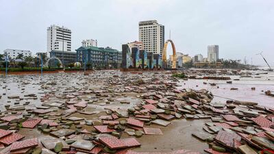 Cua Lo beach littered with debris after Typhoon Bualoi made landfall in Nghe An province. Vietnam said it evacuated almost 30,000 residents from coastal areas, before the storm ploughed through the country's steel-producing central belt. AFP