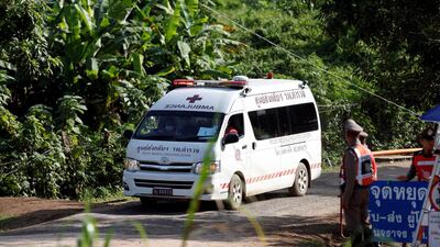 An ambulance believed to be carrying rescued schoolboys leaves from Tham Luang cave complex. Reuters