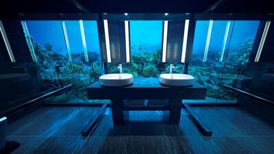 Ever fancied a bathroom with an underwater lookout? Courtesy: Conrad Maldives