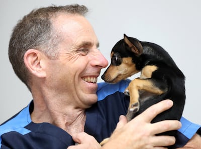 Dr Sam Westhead and his dog Goli. Chris Whiteoak / The National