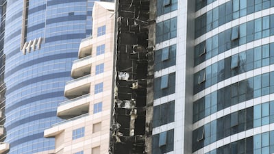 DUBAI, UNITED ARAB EMIRATES - AUG 4: Dubai Marina's Torch Tower, one of the world's tallest residential buildings, after a fire started last night. (Photo by Reem Mohammed/The National) Section: NA