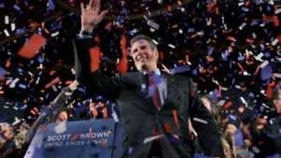 Scott Brown, the Republican senator, celebrates in Boston after winning an election held to fill Ted Kennedy's former senate seat.