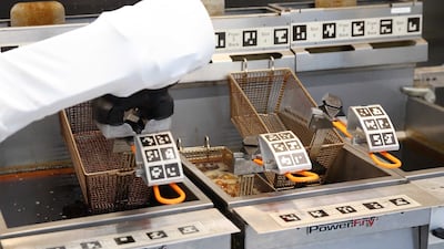 A series of codes and stickers help the robot to identify different foodstuffs.